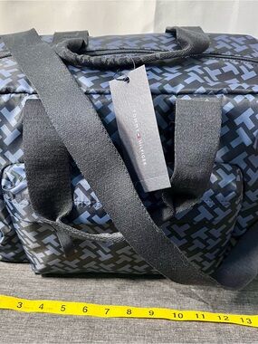 NWT Tommy Hilfiger Navy and Black Geometric Duffel Bag retail tag: $148